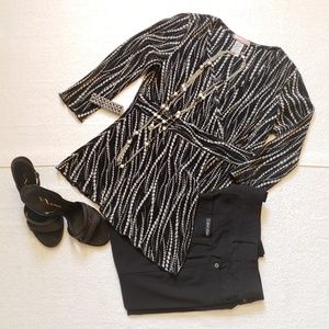 🐱Vol. 1 Asymmetrical Hem Top